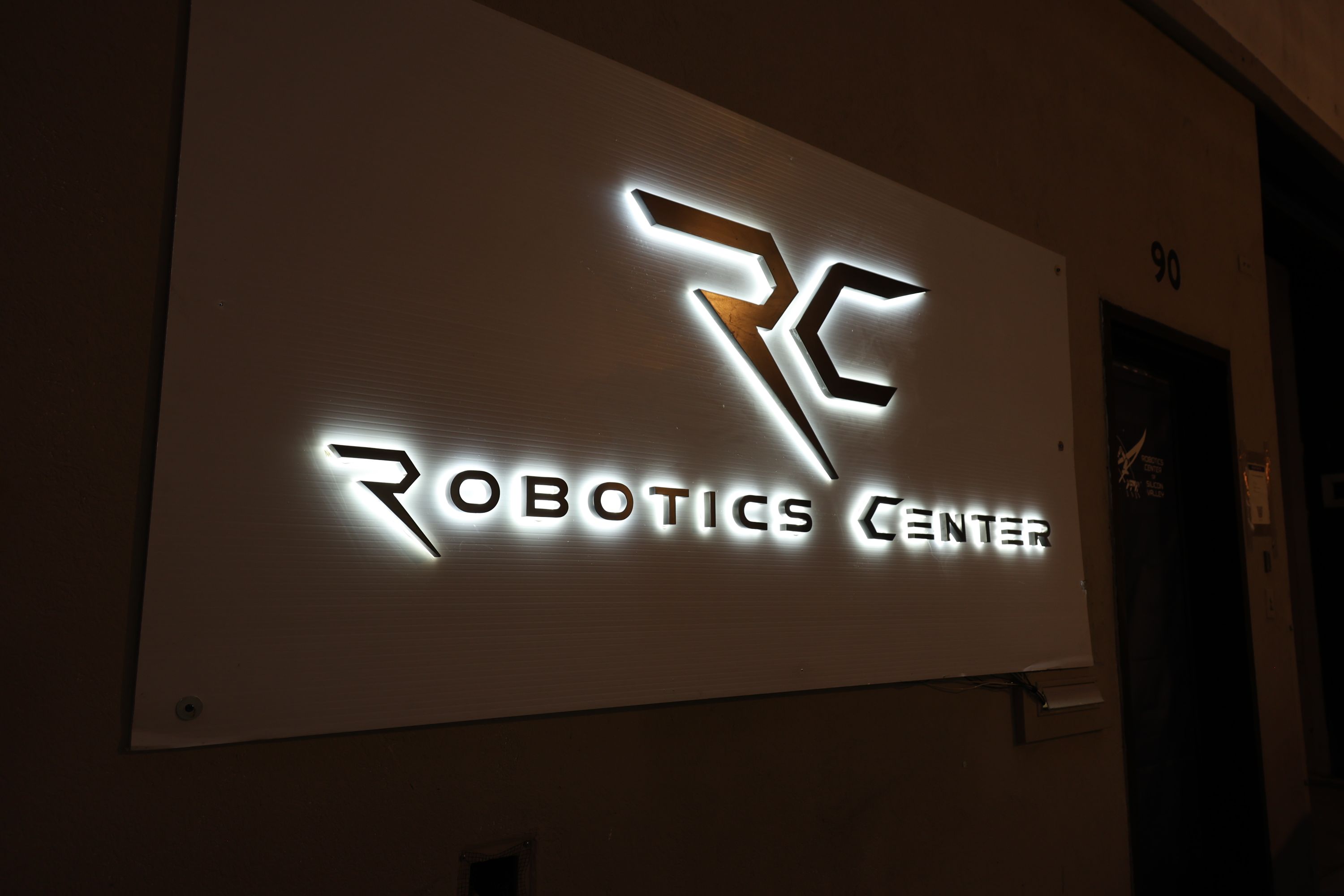 Illuminated Robotics Center sign outside the San Francisco headquarters
